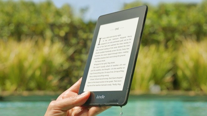 Hand Holding a Kindle Paperwhite