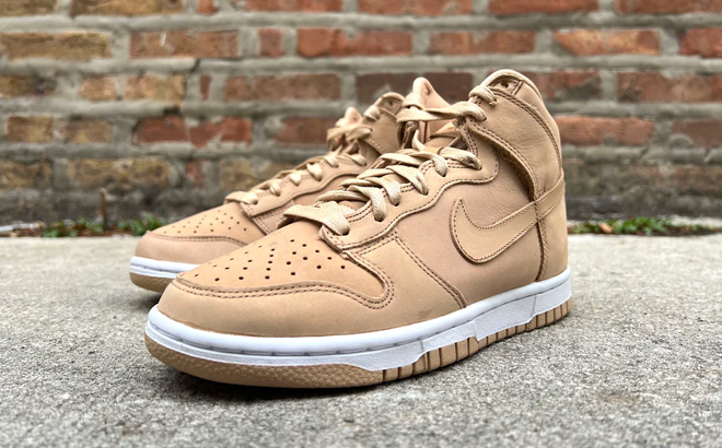 Nike Dunk High Premium Shoes in front of a Brick Wall