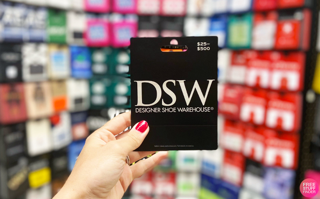 Person Holding a DSW Gift Card