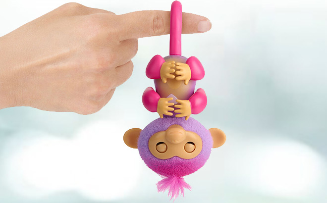 Pink Fingerlings Baby Monkey Hanging on a Finger