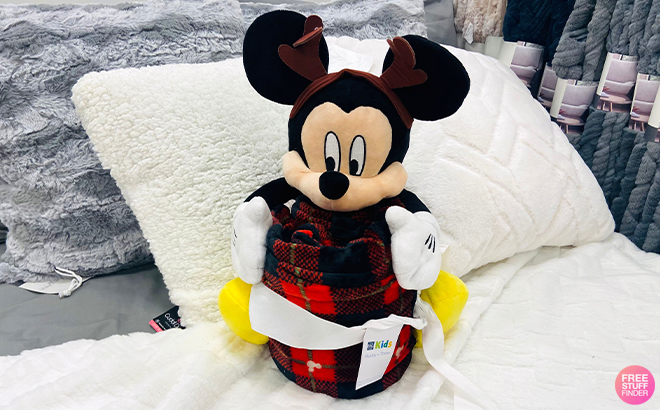 The Big One Disney Mickey Mouse Holiday Pillow Buddy & Throw Blanket on a Bed