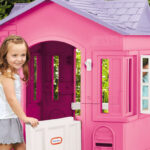 Two Girls Playing in Little Tikes Cape Cottage House