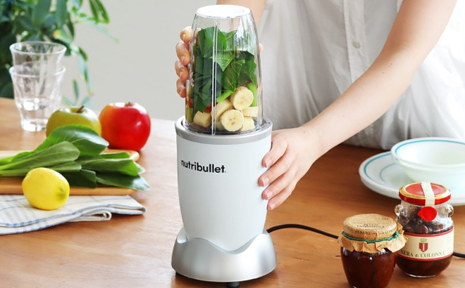 Woman Using the Nutribullet Pro 900 Series in White Color