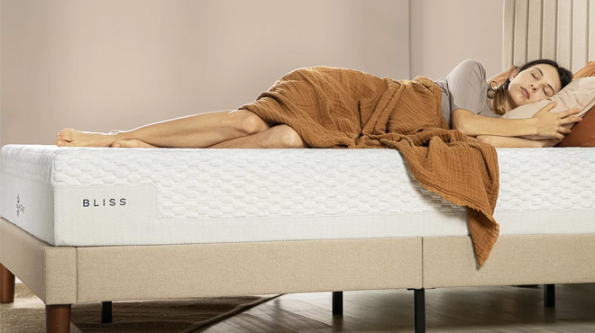 a Woman Sleeping on Bed with Zinus Mattress