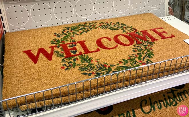 an Image of Wondershop Welcome Wreath Flocked Coir Christmas Doormat