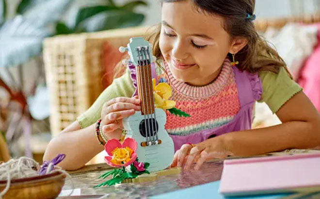 A Girl Playing LEGO Tropical Ukulele