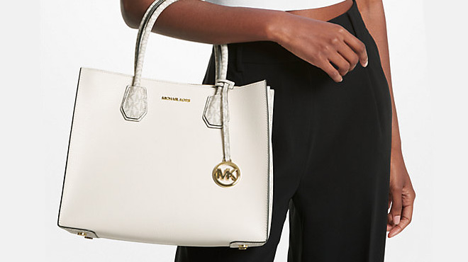 A Lady Carrying Michael Kors Large Signature Logo Accordion Tote Bag