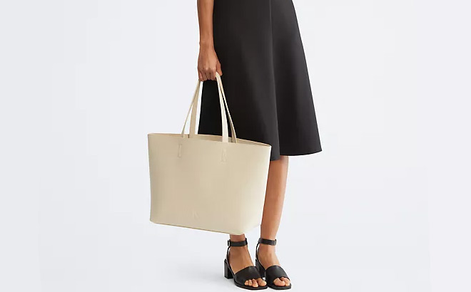 A Lady Carrying a Calvin Klein All Day Tote Bag