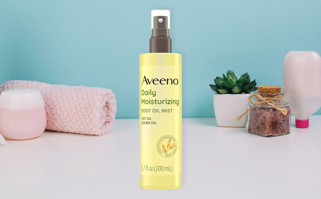 Aveeno Daily Moisturizing Dry Body Oil Mist on the Table