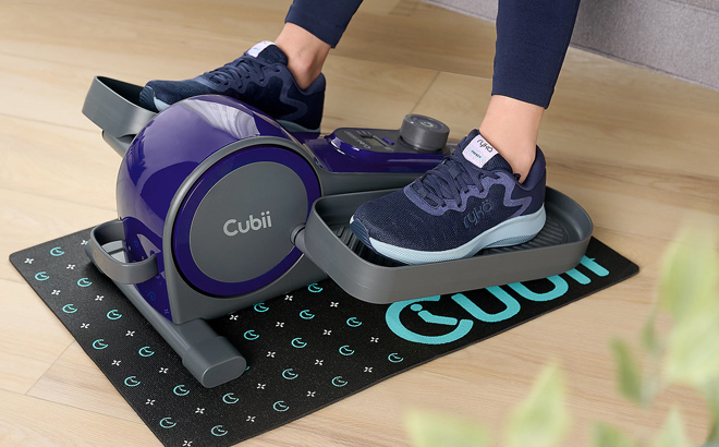 Cubii Groove Compact Seated Elliptical on a Wooden Floor