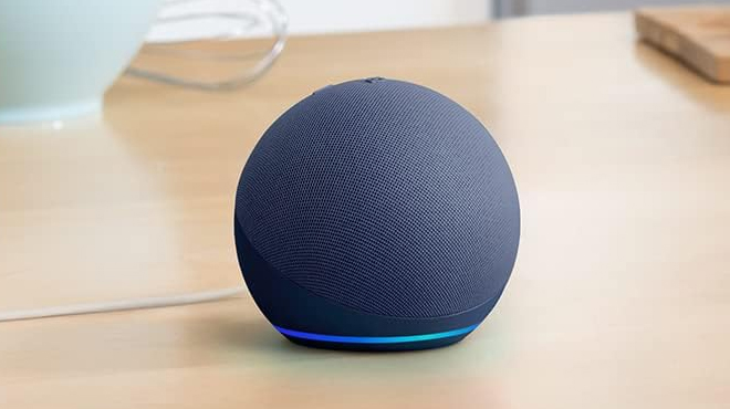 Echo Dot 5th Gen in Deep Sea Blue on a Table