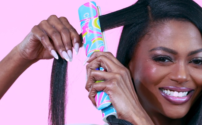 Girl Ironing Her Hair with CHI x Barbie Ceramic Hairstyling Iron