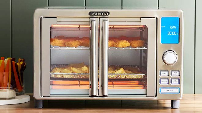 Gourmia French Door Digital Air Fryer Oven with food inside