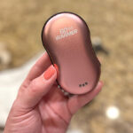 Hand Holding Go Warmer Hand Heater in Rose Gold Color