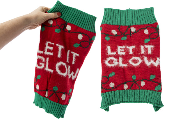 Hand Holding Pet Christmas Sweater Let it Glow