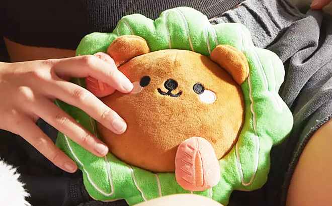 Hand Holding a Smoko Bear Toasty Heatable Plushie