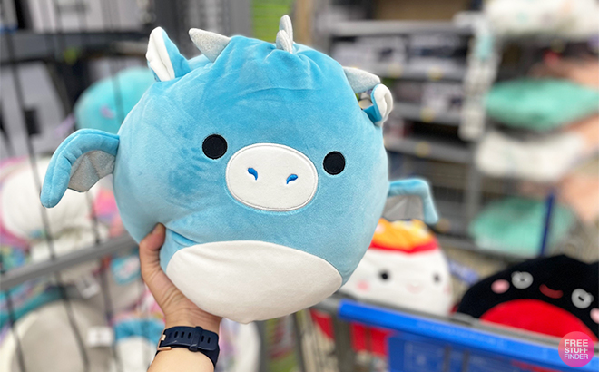 Hand Holding s Squishmallow at Walmart