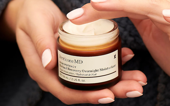 Hands Holding Perricone MD Retinol Recovery Overnight Moisturizer