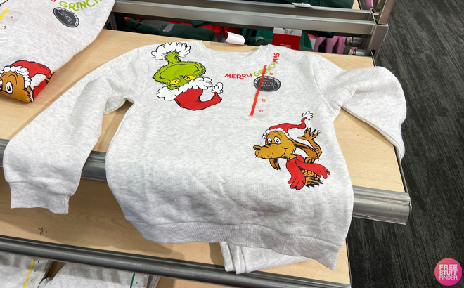 Kids The Grinch Matching Family Christmas Sweatshirt on Display