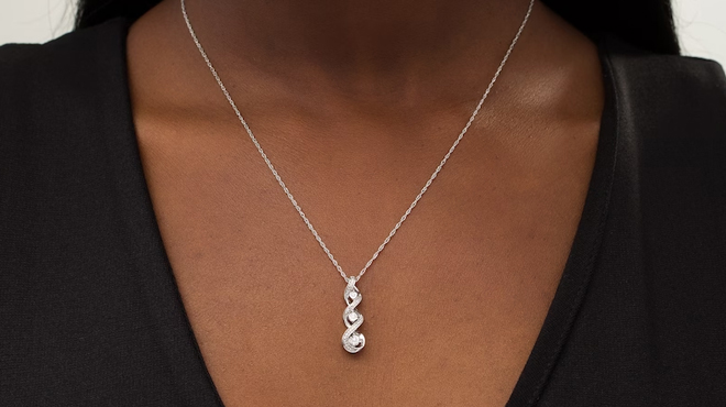 Lady Wearing Zales Diamond Accent Cascading Infinity Pendant