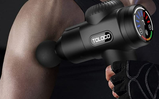 Man is Holding Toloco Massage Gun Deep Tissue