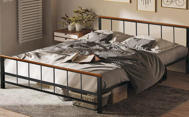 Metal Platform Queen Bed Frame with Matress sheets and pillows in a room