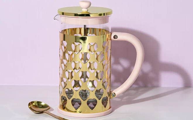 https://www.freestufffinder.com/wp-content/uploads/2023/12/Paris-Hilton-French-Press-Coffee-Maker-with-Heart-Shaped-Measuring-Scoop.jpg