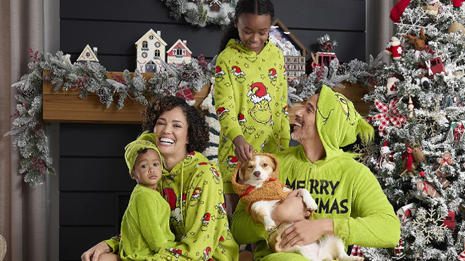 People wearing Grinch One Piece Matching Family Pajamas