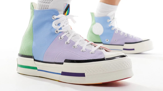 Person Wearing Converse Chuck Taylor 70 Hi Pride Sneakers in Multi