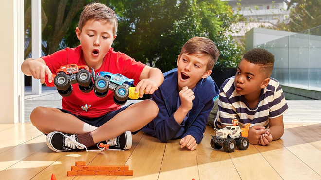 Three Kids Playing with Zuru Smashers Surprise Monster Truck Toy