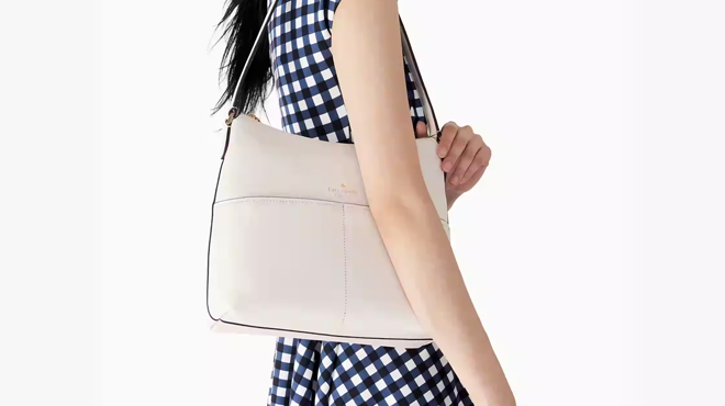 Woman Carrying a Kate Spade Bailey Shoulder Bag