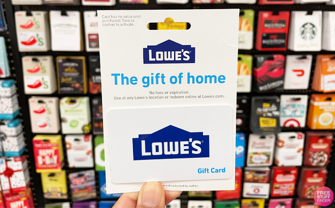 Woman Holding a Lowes Gift Card