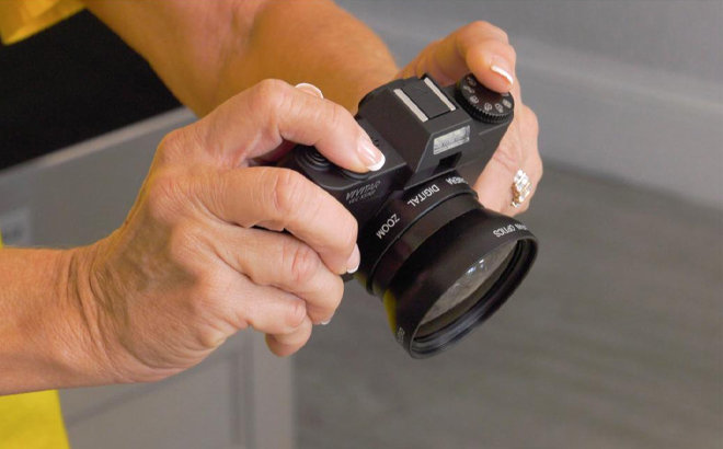 Woman Holding a Vivitar 4K Digital Camera