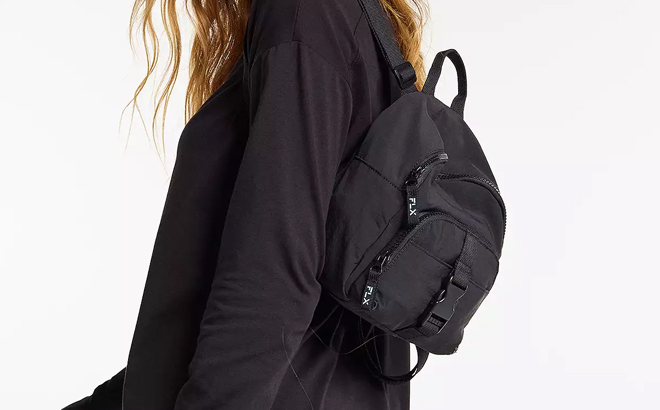 Woman Wearing FLX Mini Top Zip Backpack