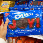 Woman holding a Oreo Joy Red Creme Filled Cookies