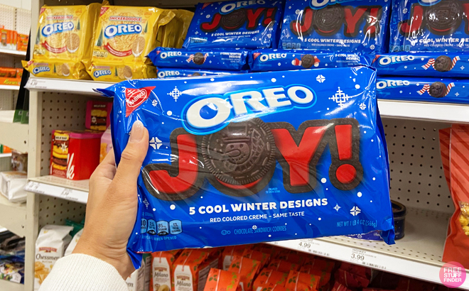 Woman holding a Oreo Joy Red Creme Filled Cookies