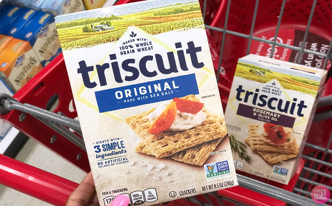 Woman holding a Triscuit Original Crackers