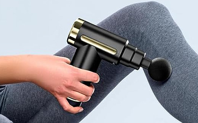 Woman is Holding Morelax Mini Massage Gun