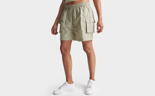 Woman is Wearing Pink Soda Sport Rox Cargo Shorts in Agate Grey Color