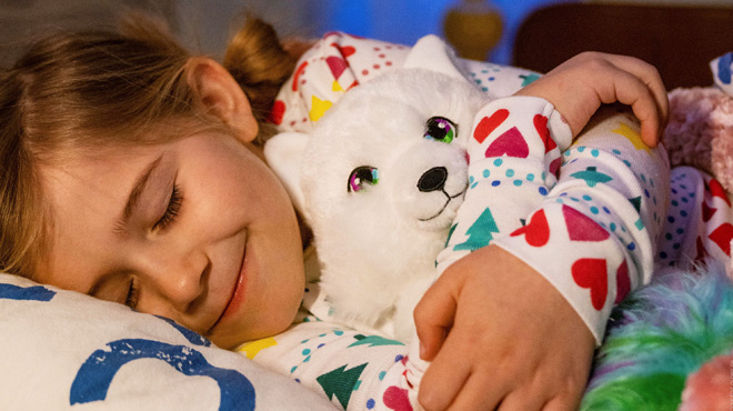 a Child Hugging Extraordinary Noorah Plush Arctic Fox