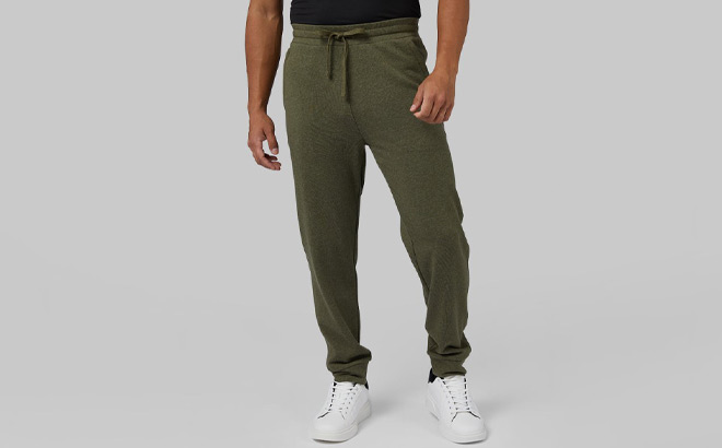 a Man Wearing 32 Degrees Comfort Terry Joggers in Grape Color