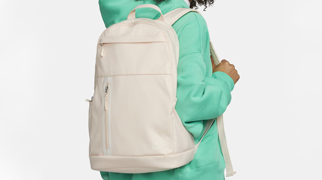 a Person Carrying a Nike Elemental Premium Backpack