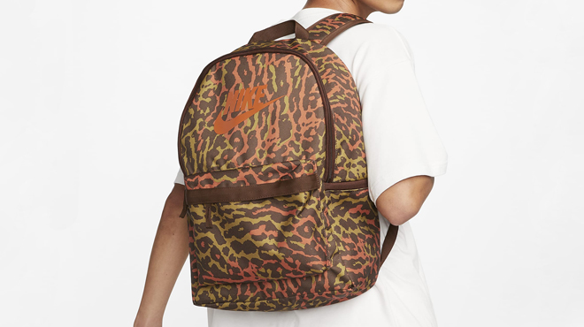 a Person Carrying a Nike Heritage Backpack