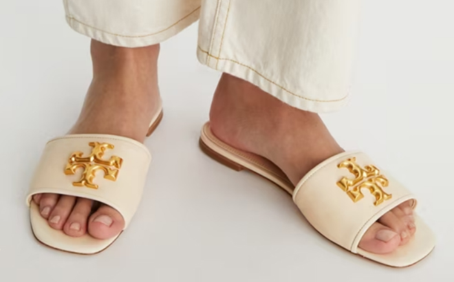 a Person Wearing a Tory Burch Eleanor Slides