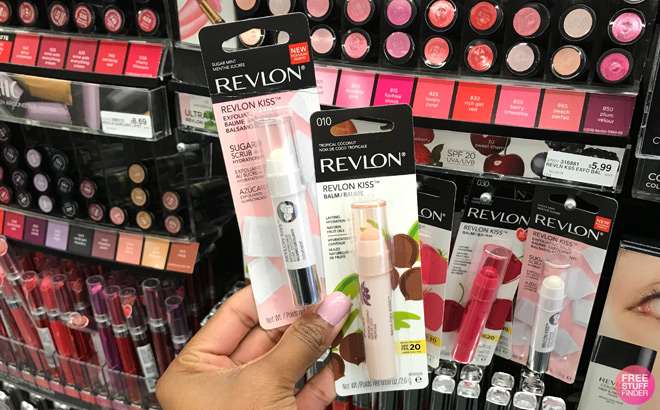 A Person Holdig Revlon Kiss Lip Balms