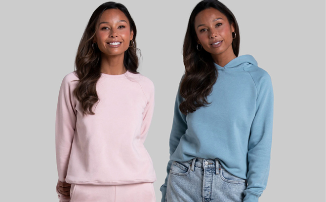 A Woman Wearing Fruit of the Loom Womens Fleece Sweatshirt on the Left and Hoodie on the Right