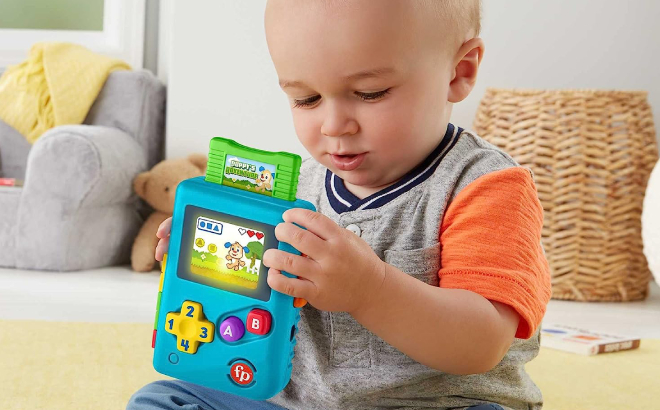 Baby Boy Playing with Fisher Price Lil Gamer Pretend Video Game