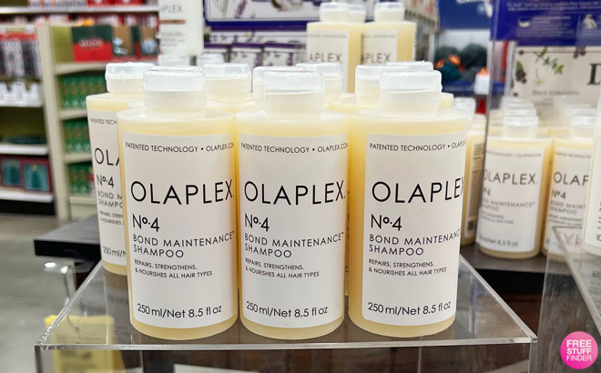 Bottles of Olaplex No 4 on a Display Stand