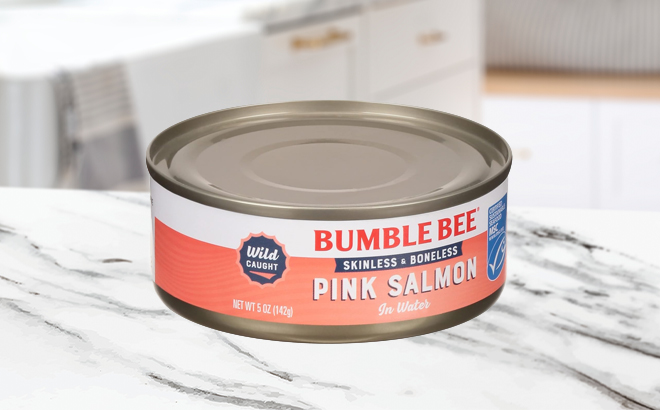 Bumble Bee Skinless Boneless Chunk Light Pink Salmon in Water Can on a Kitchen Counter