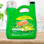 Gain Aroma Boost Original Detergent 107 Count on a Table